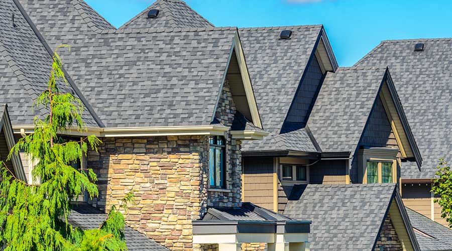 side-view-of-houses-with-gray-shingle-roofs-horizon-city-tx